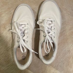 White canvas Adidas sneakers